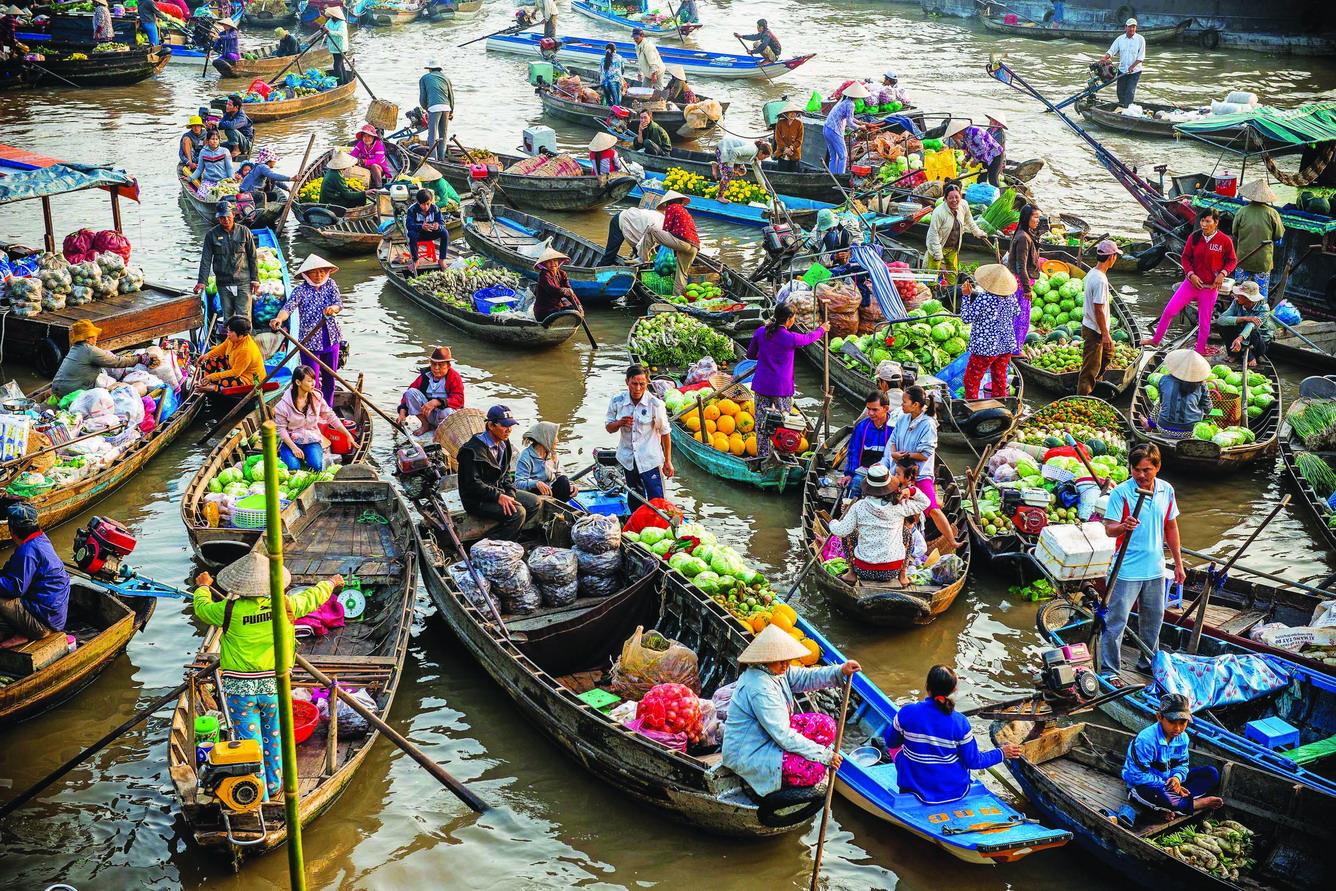 chợ nổi Cái Răng Cần Thơ điểm tham quan khi thuê xe 7 chỗ từ Sài Gòn